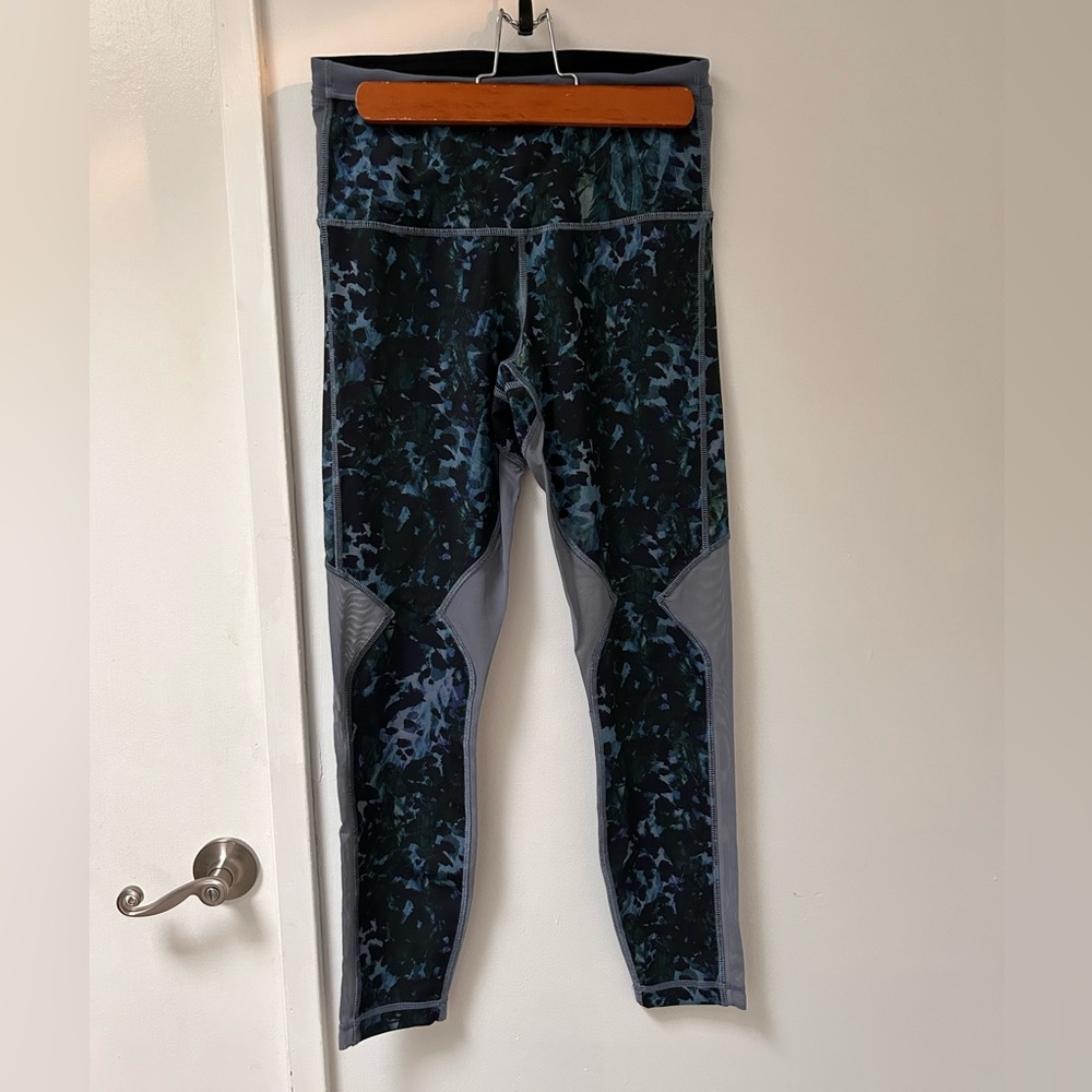 Lululemon running leggings, size 4, with mesh panels
